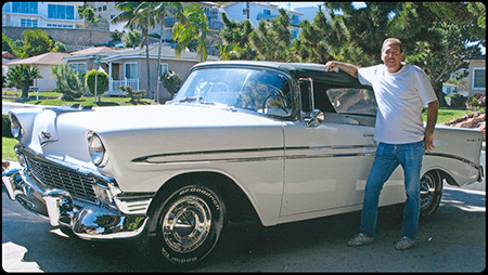 Michael Delees standing in front of his 1956 Chevy Bel-Air